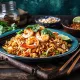 Nouilles sautées au Poulet & aux légumes.