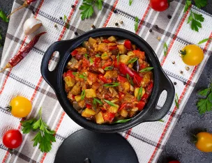 Escalope de dinde gratinée sauce Atelier Salé et linguine.