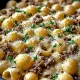 Grosses Coquillettes au boeuf, crème de parmesan parfumée à l'ail.