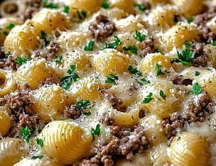 Grosses Coquillettes au boeuf, crème de parmesan parfumée à l'ail.