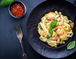 Tagliatelle aux Scampis à la crème d'ail & persil