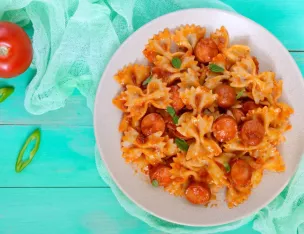 Farfalle à la saucisse de Volaille, sauce crémeuse aux poivrons.